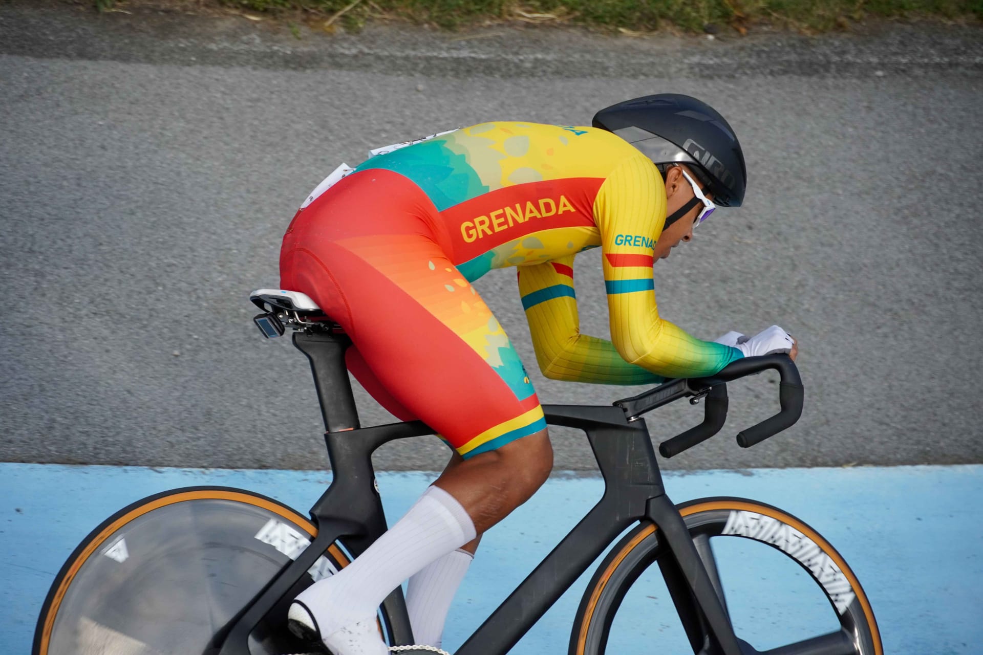 Red Walters racing in Grenada colours on the velodrome